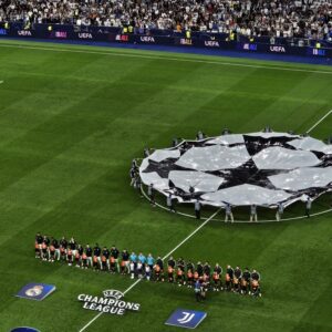 Line up before kick-off at the Santiago Bernabéu during Real Madrid vs Juventus in the Champions League.